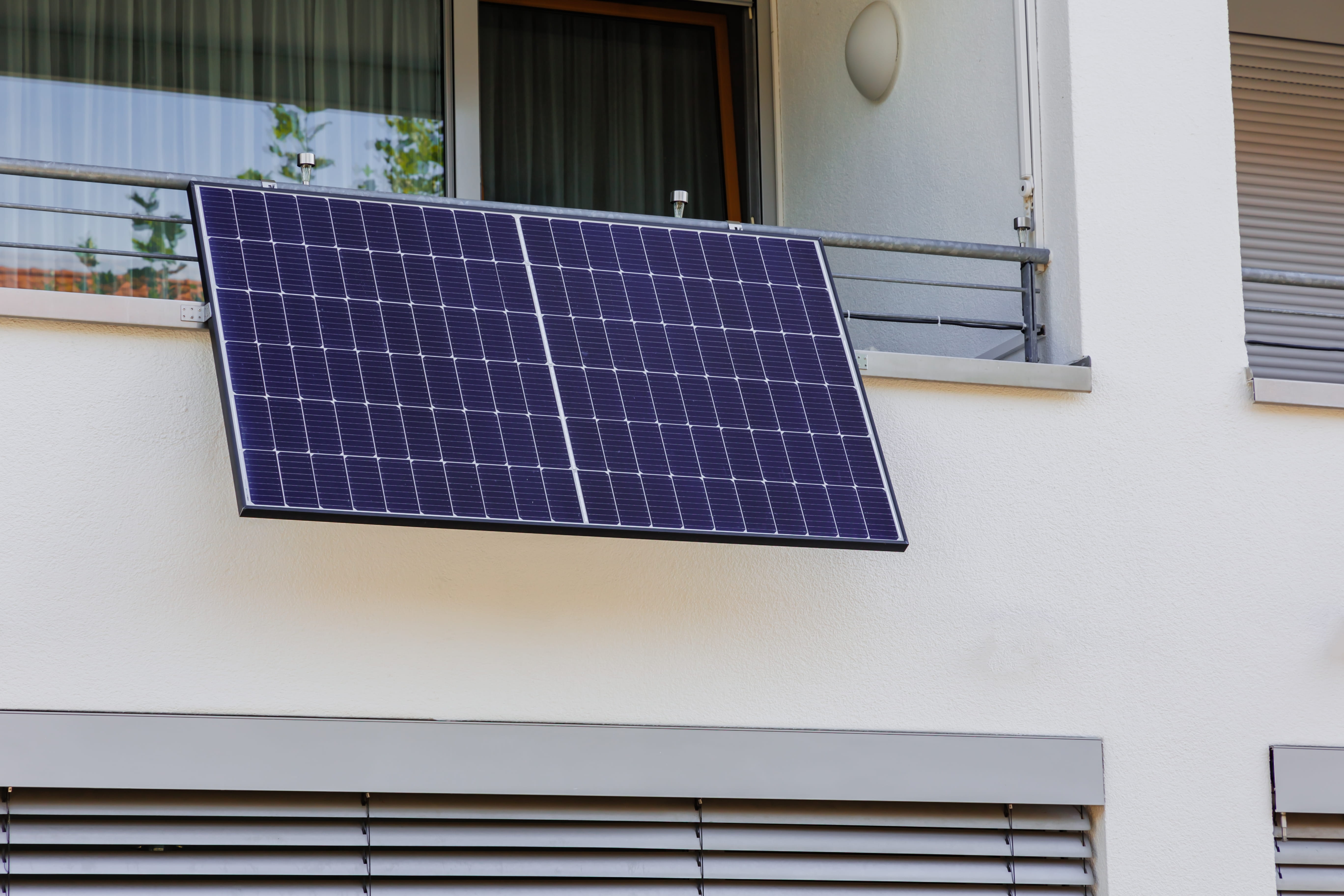 What are plug-in solar panels hanging from balcony