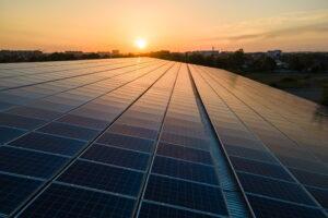 Large roof at sunset after commercial solar panel installation in Essex